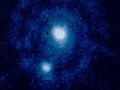 An enlarged image of Pluto and Charon